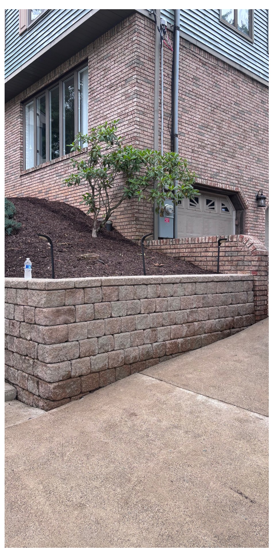 Retaining wall restoration after