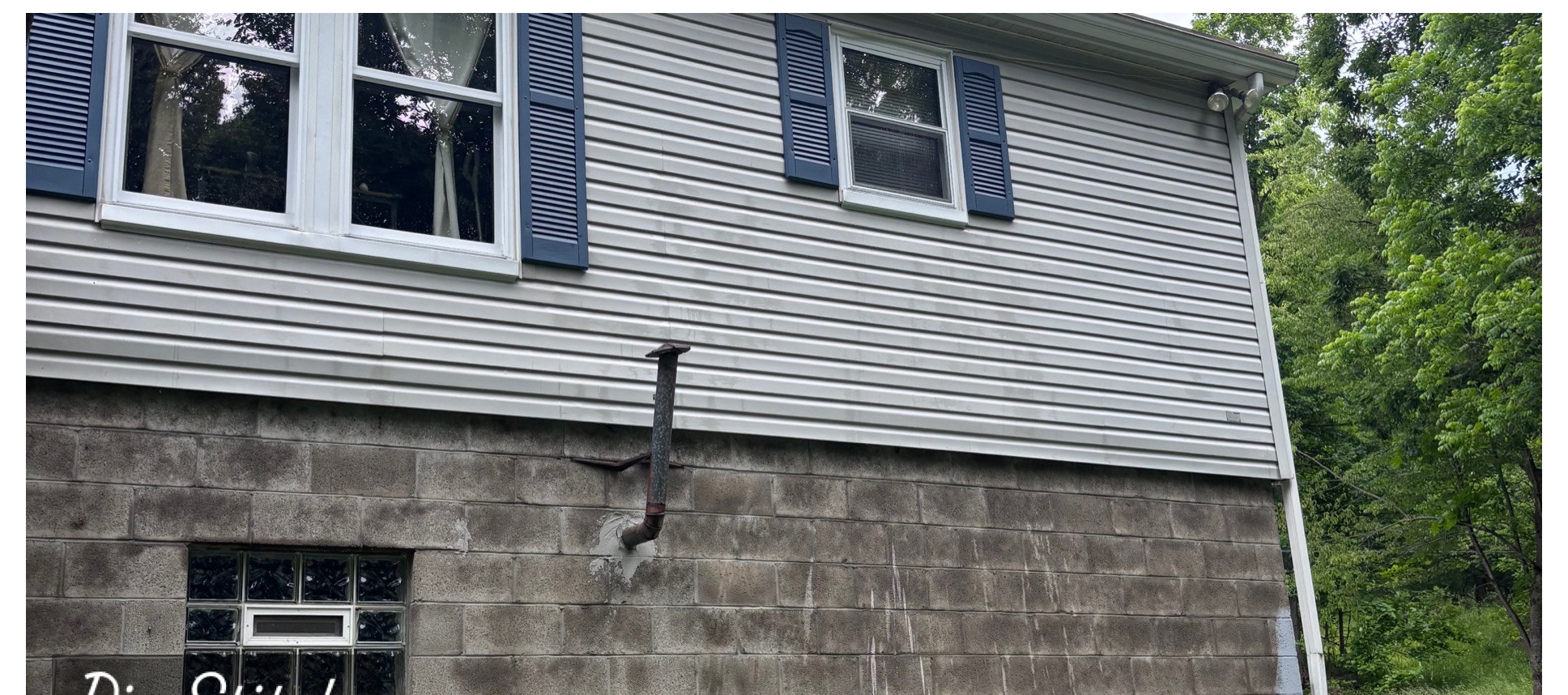 House siding & foundation wash after