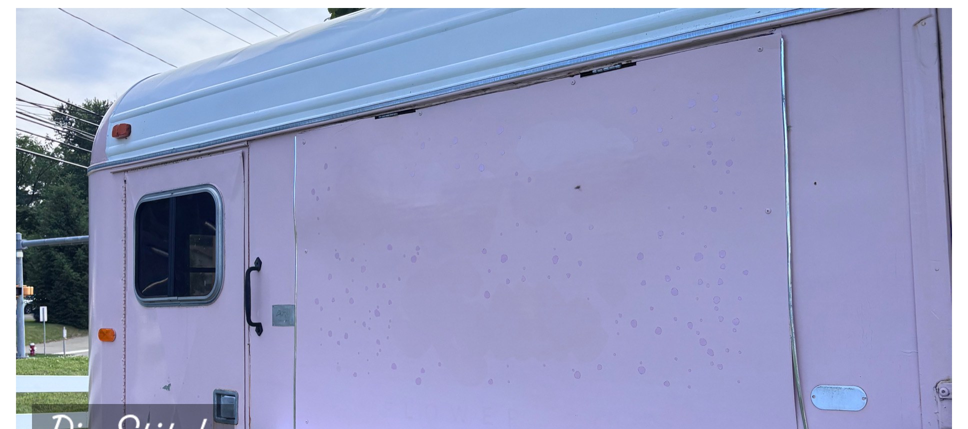 Camper side panel wash after