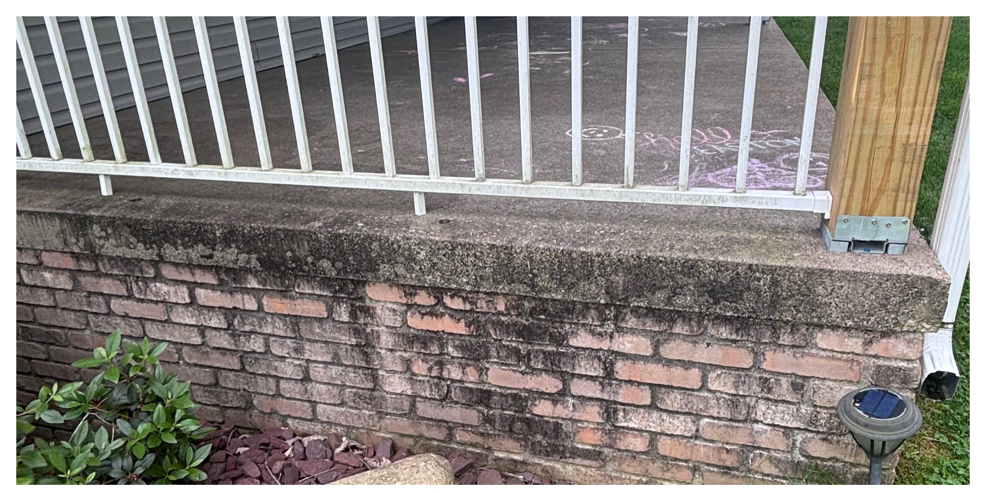 Brick foundation & porch cleanup before