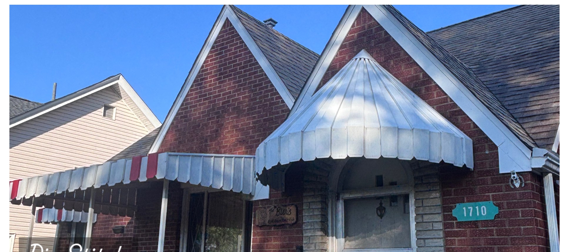 Front entry awning & brick detail after