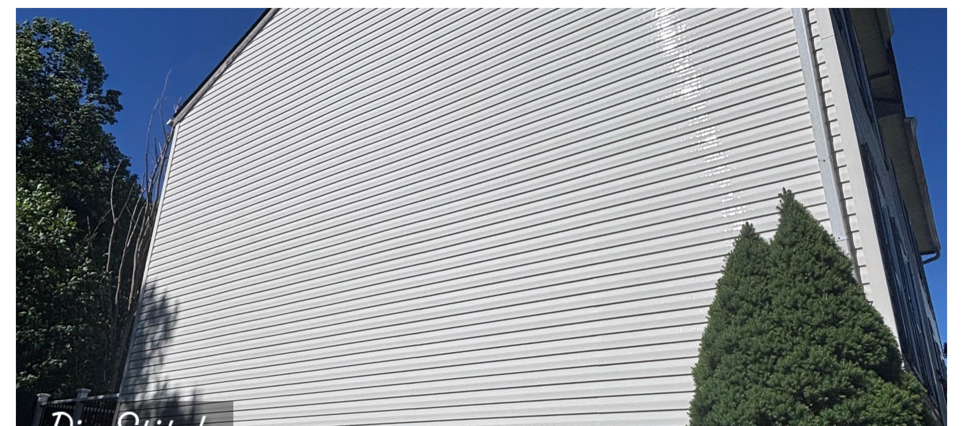 Tall siding wall soft wash after