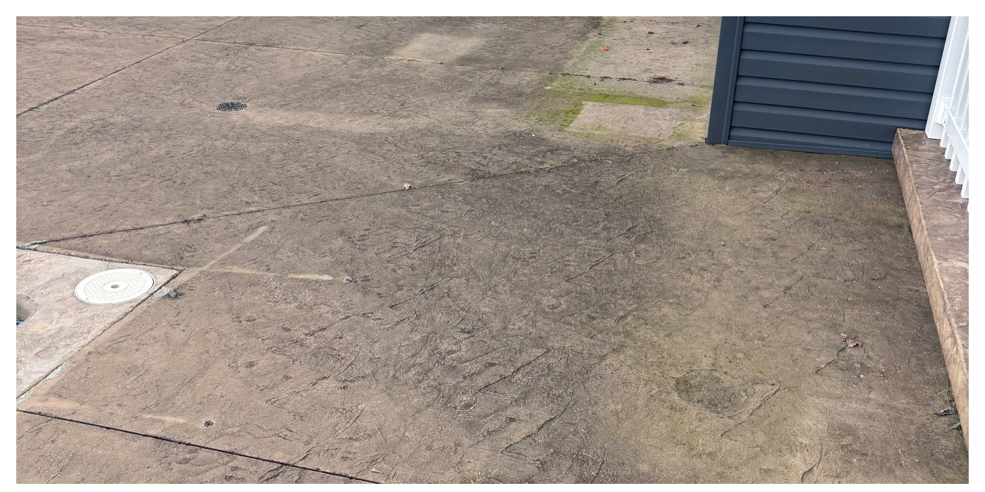 Pool deck stain removal close-up before