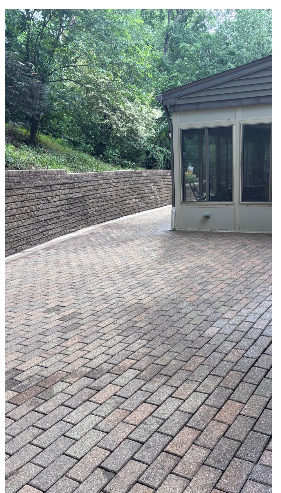 Brick paver back patio after