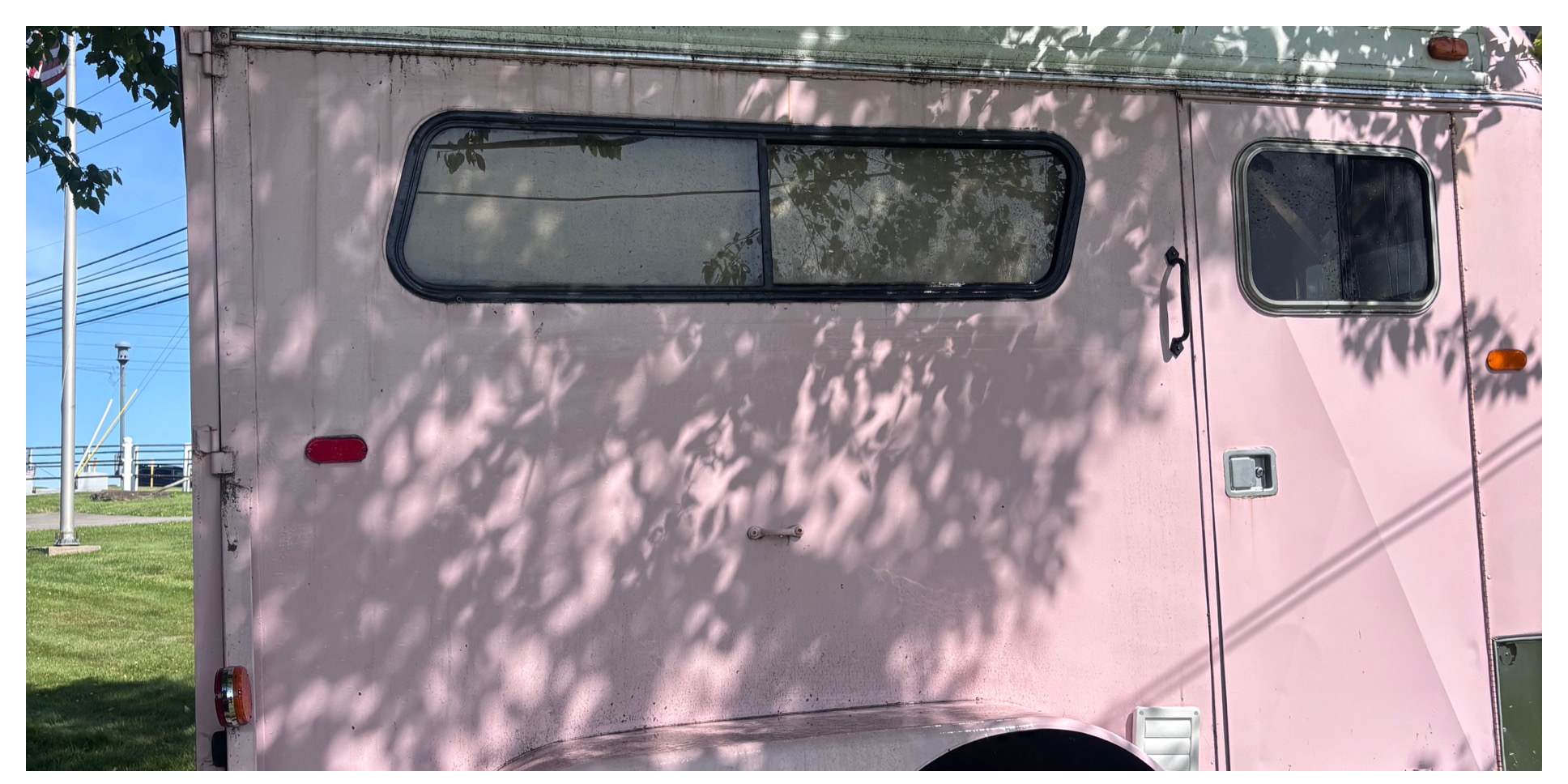 Camper rear window panel before