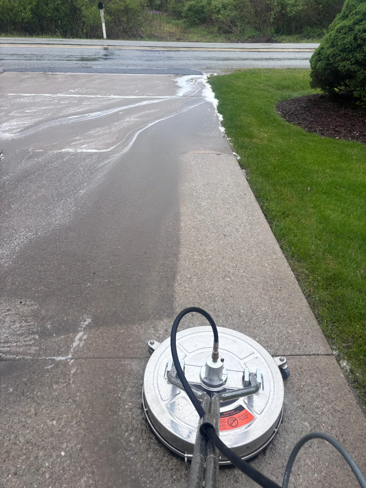 Driveway cleaning in progress