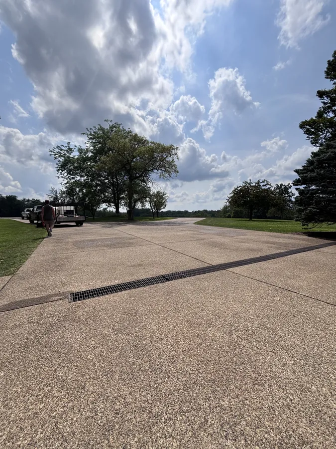 Wide aggregate driveway after cleaning